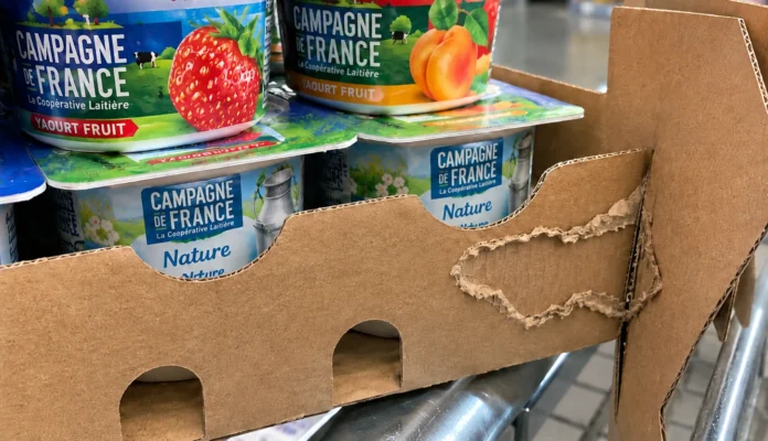 Caja de cartón reciclado con problema de adhesión en línea de empaque
